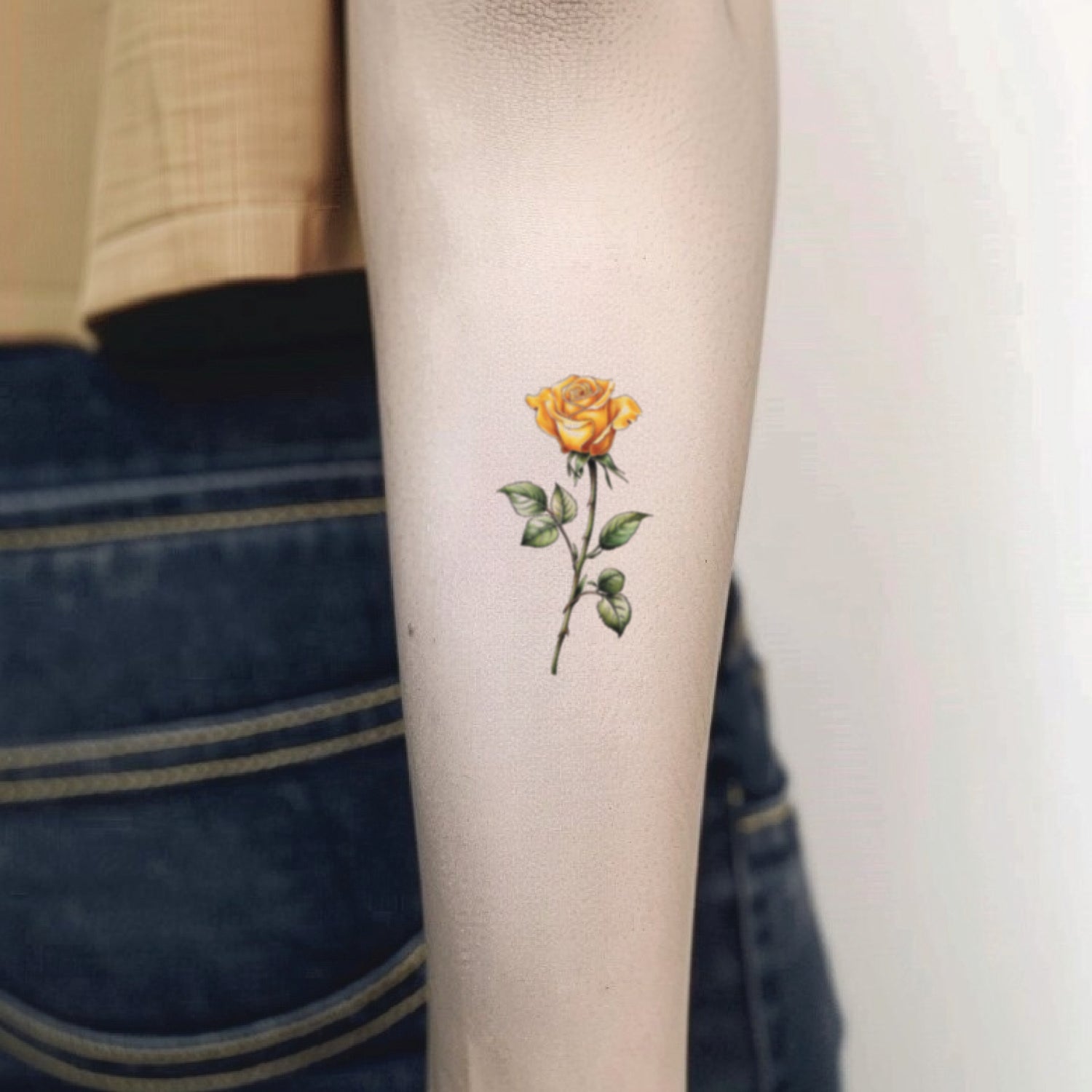 best cool simple small yellow color Rose flower floral fake realistic temporary tattoo sticker design idea drawing for men and women on forearm lower arm