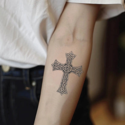 best cool simple small black grey color celtic cross fake realistic temporary tattoo sticker design idea drawing for men and women on forearm lower inner arm