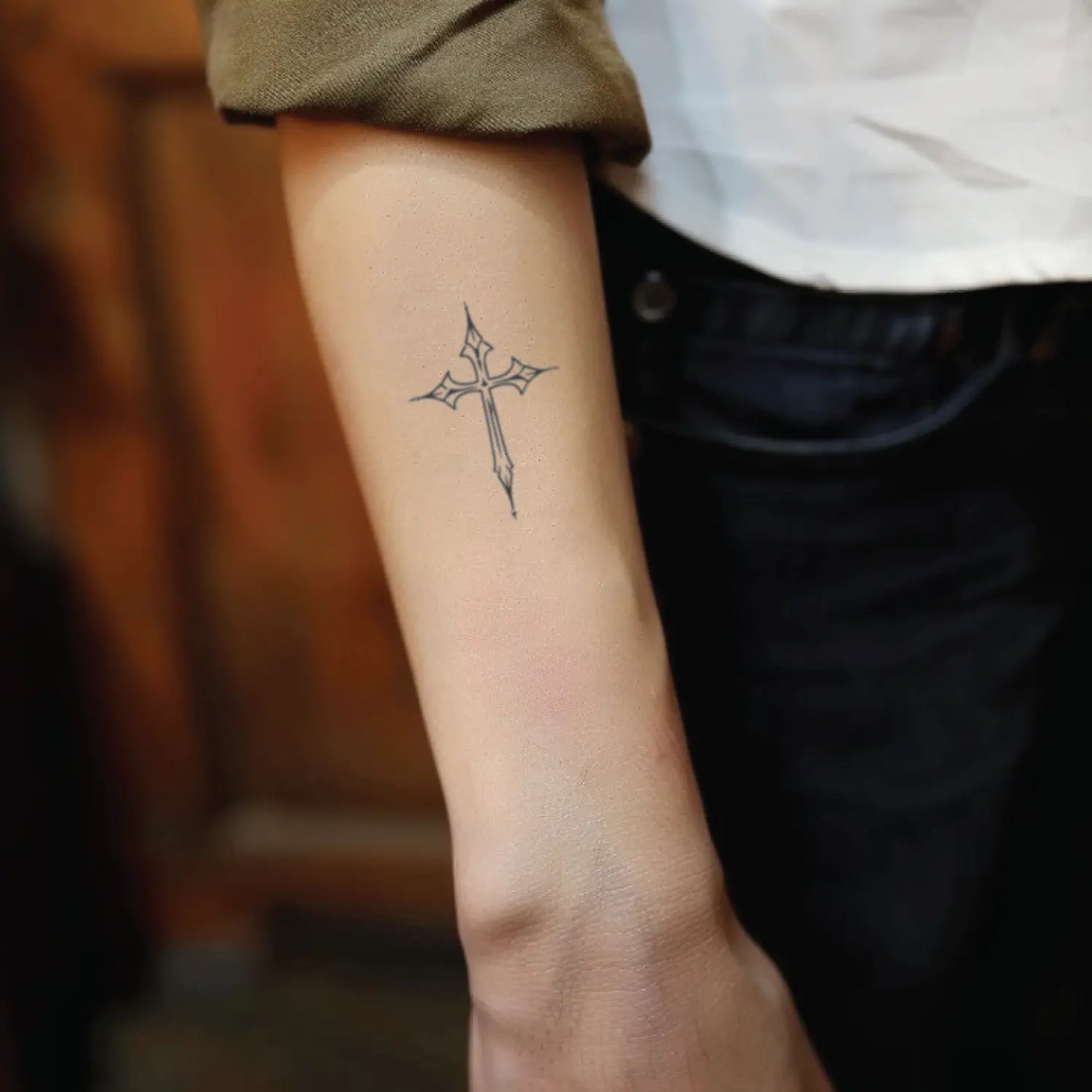 best cool simple small black grey color cross outline fake realistic temporary tattoo sticker design idea drawing for men and women on forearm lower arm