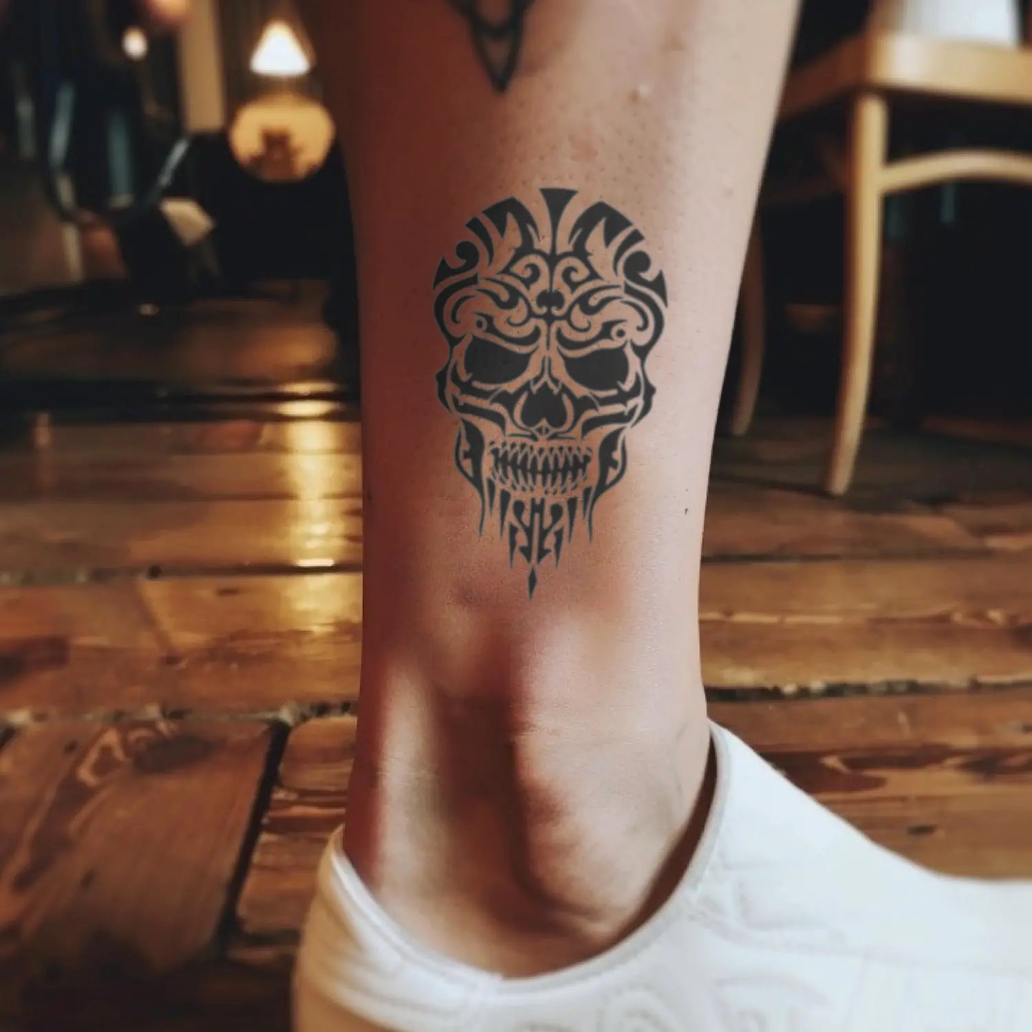 best cool simple small black color tribal skull fake realistic temporary tattoo sticker design idea drawing for men and women on ankle lower leg