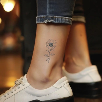 best cool simple small black color simple sunflower outline fake realistic temporary tattoo sticker design idea drawing for men and women on ankle leg