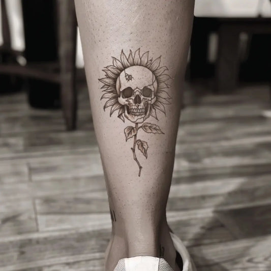 best cool simple small black sunflower skull fake realistic temporary tattoo sticker design idea drawing for men and women on calf lower leg back