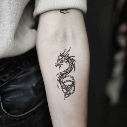 best cool simple small black color celtic viking nordic dragon fake realistic temporary tattoo sticker design idea drawing for men and women on forearm lower inner arm