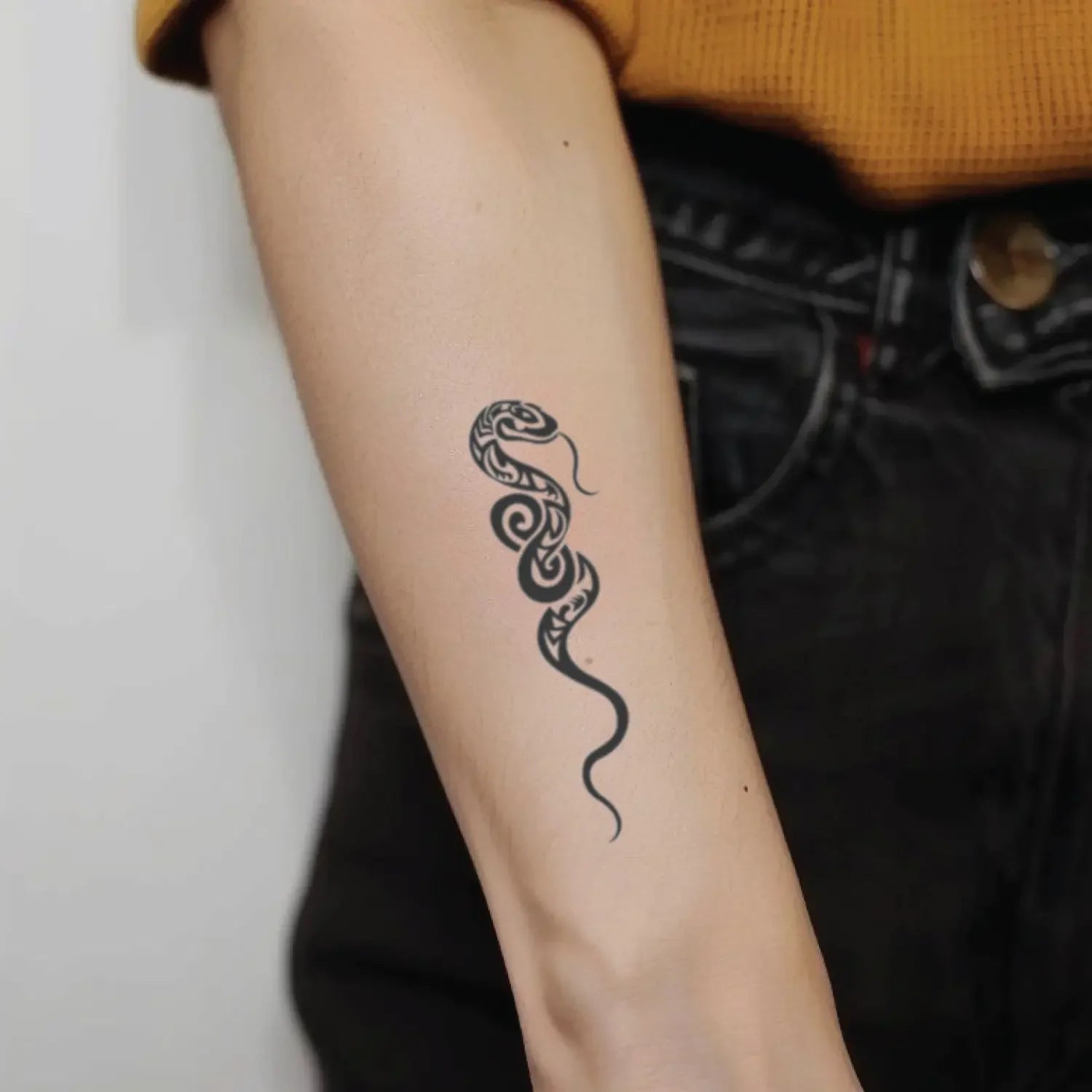 best cool simple small black color tribal snake fake realistic temporary tattoo sticker design idea drawing for men and women on forearm lower arm