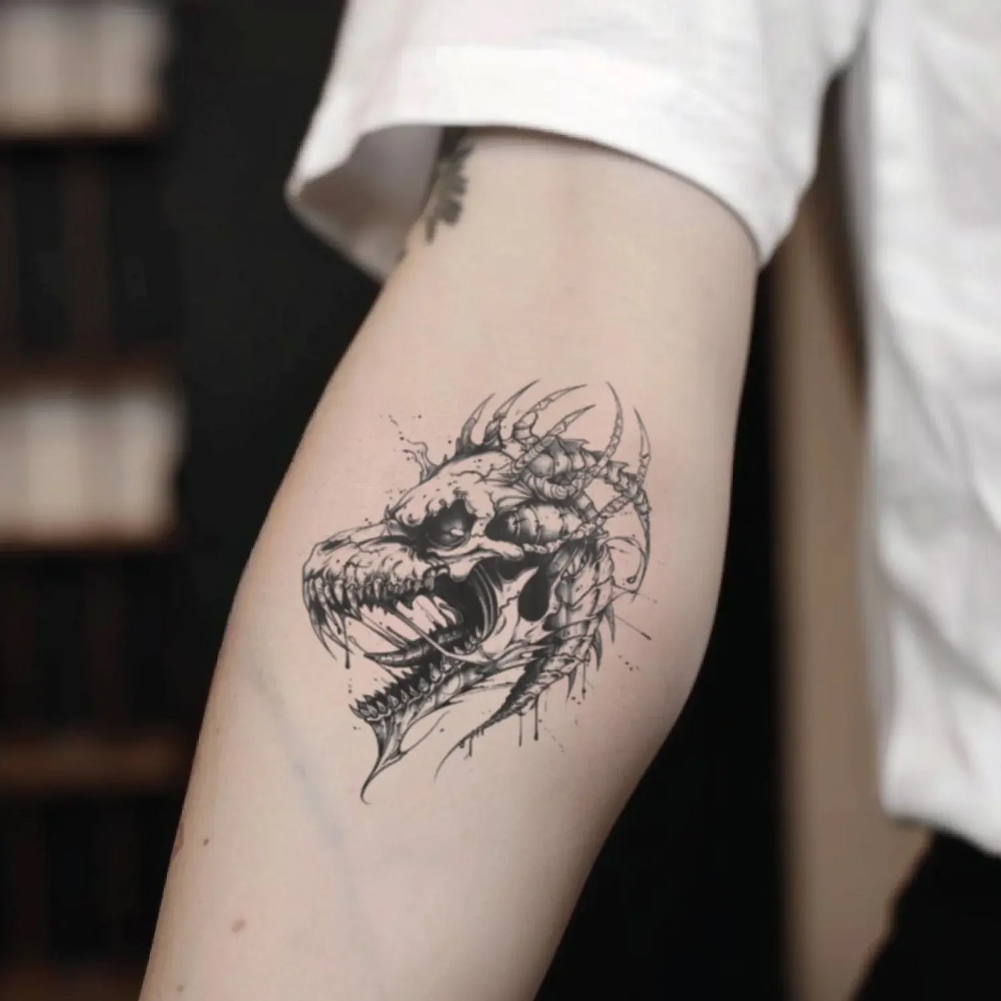 best cool simple small black grey color dragon skull fake realistic temporary tattoo sticker design idea drawing for men and women on forearm inner arm