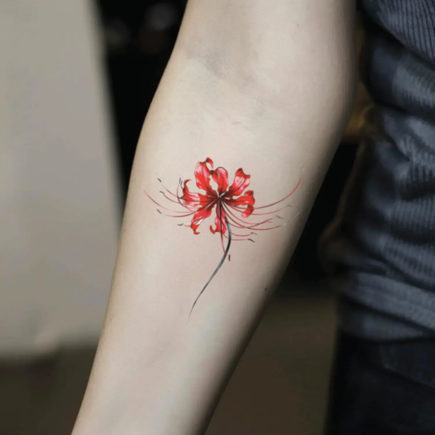 best cool simple small color red spider lily flower fake realistic temporary tattoo sticker design idea drawing for men and women on forearm inner lower arm