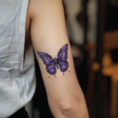 best cool simple small dark purple color butterfly fake realistic temporary tattoo sticker design idea drawing for men and women on bicep upper arm