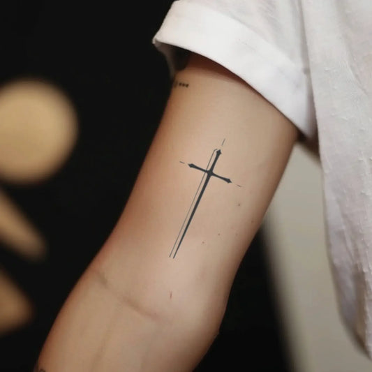 best cool simple small black color minimali fine line cross fake realistic temporary tattoo sticker design idea drawing for men and women on bicep upper arm