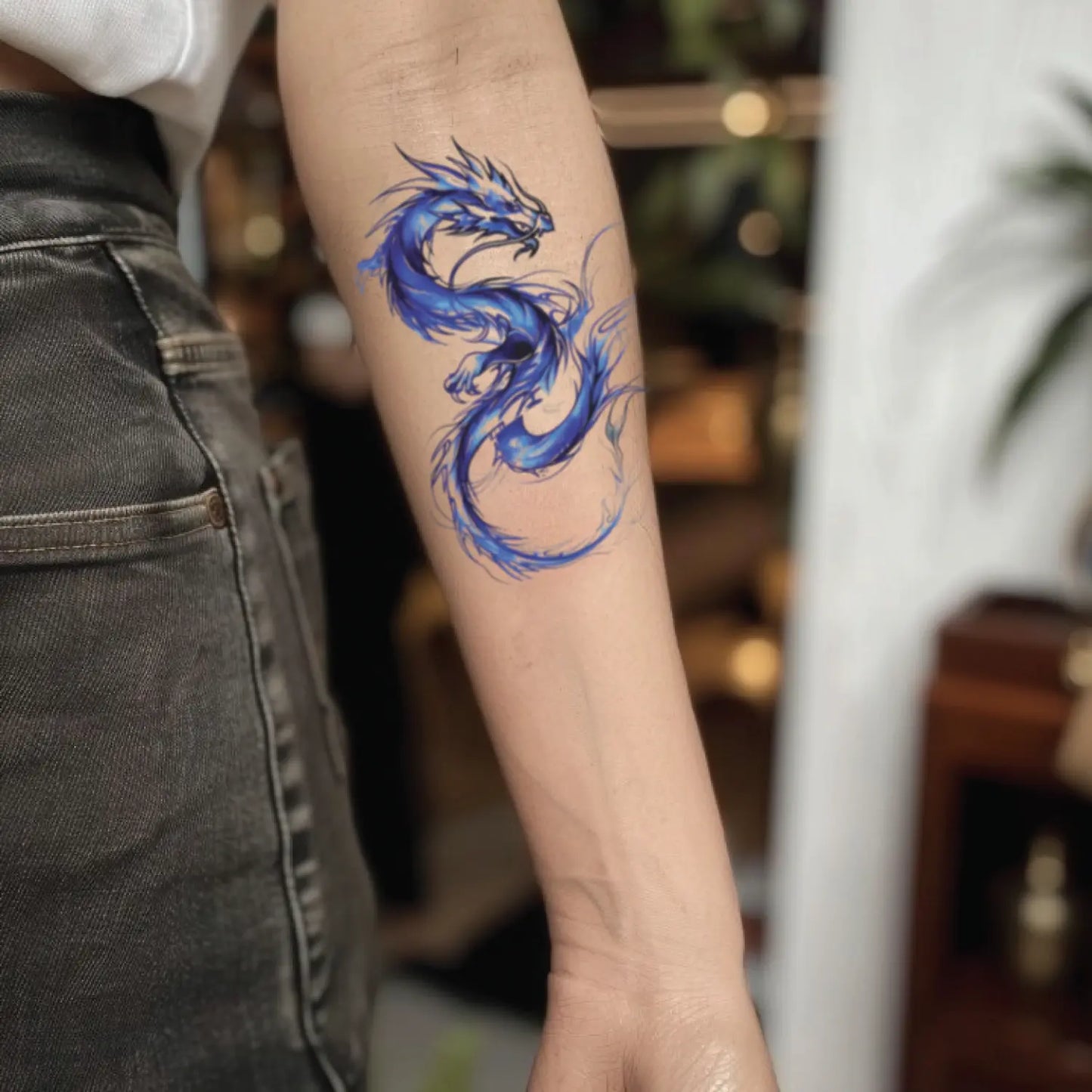 best cool simple small blue color dragon fake realistic temporary tattoo sticker design idea drawing for men and women on forearm lower inner arm