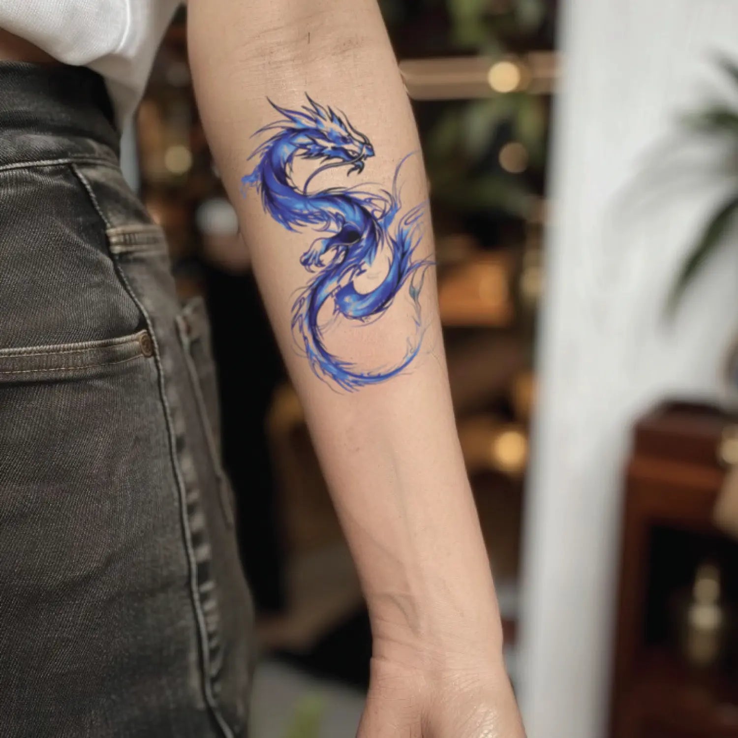 best cool simple small blue color dragon fake realistic temporary tattoo sticker design idea drawing for men and women on forearm lower inner arm