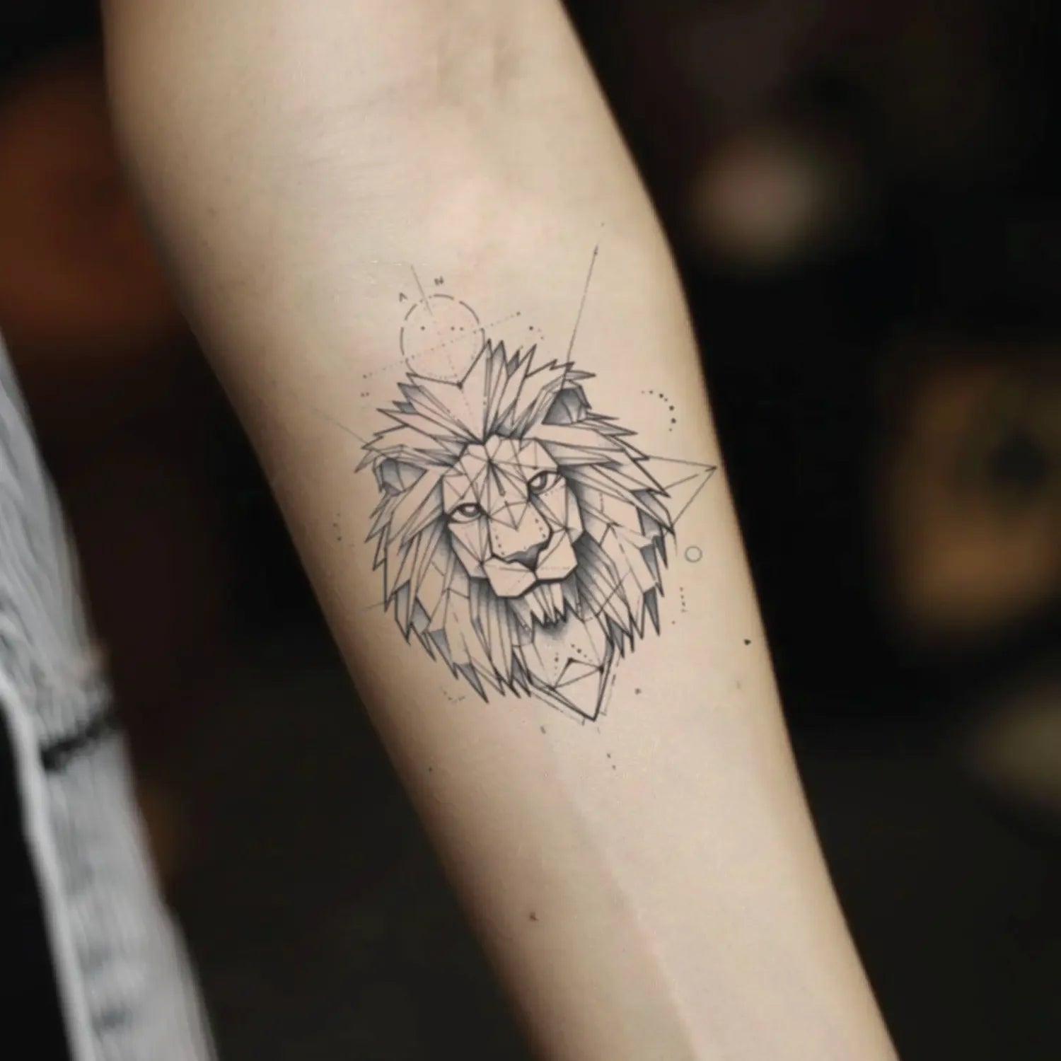 best cool simple small black grey color geometric lion fake realistic temporary tattoo sticker design idea drawing for men and women on forearm lower arm