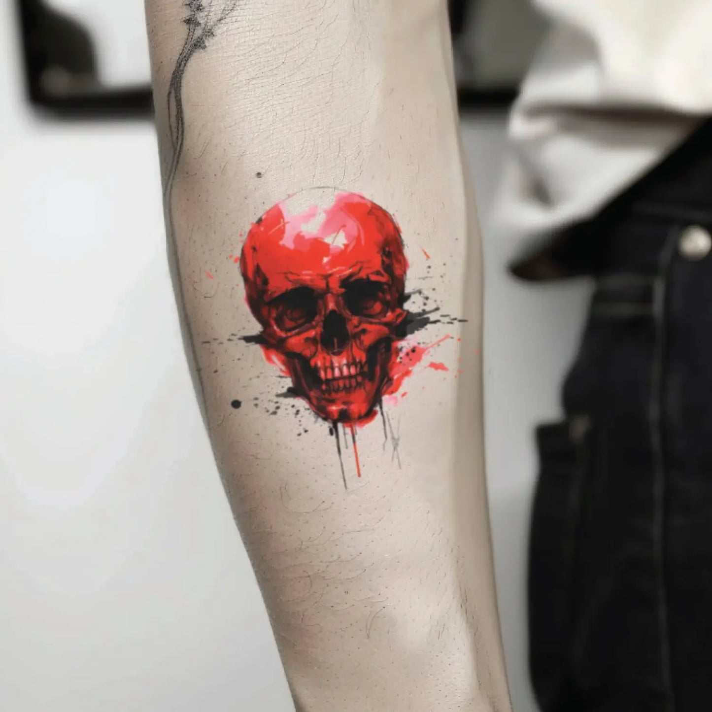 best cool simple small red color skull fake realistic temporary tattoo sticker design idea drawing for men and women on forearm lower inner arm