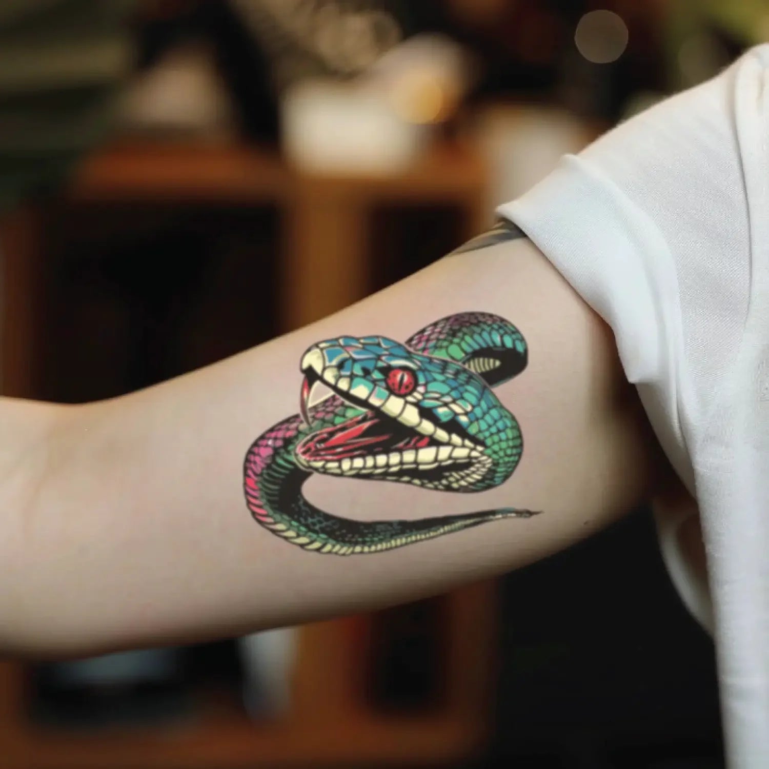 best cool simple small black colorful neo traditional snake fake realistic temporary tattoo sticker design idea drawing for men and women on bicep upper inner arm