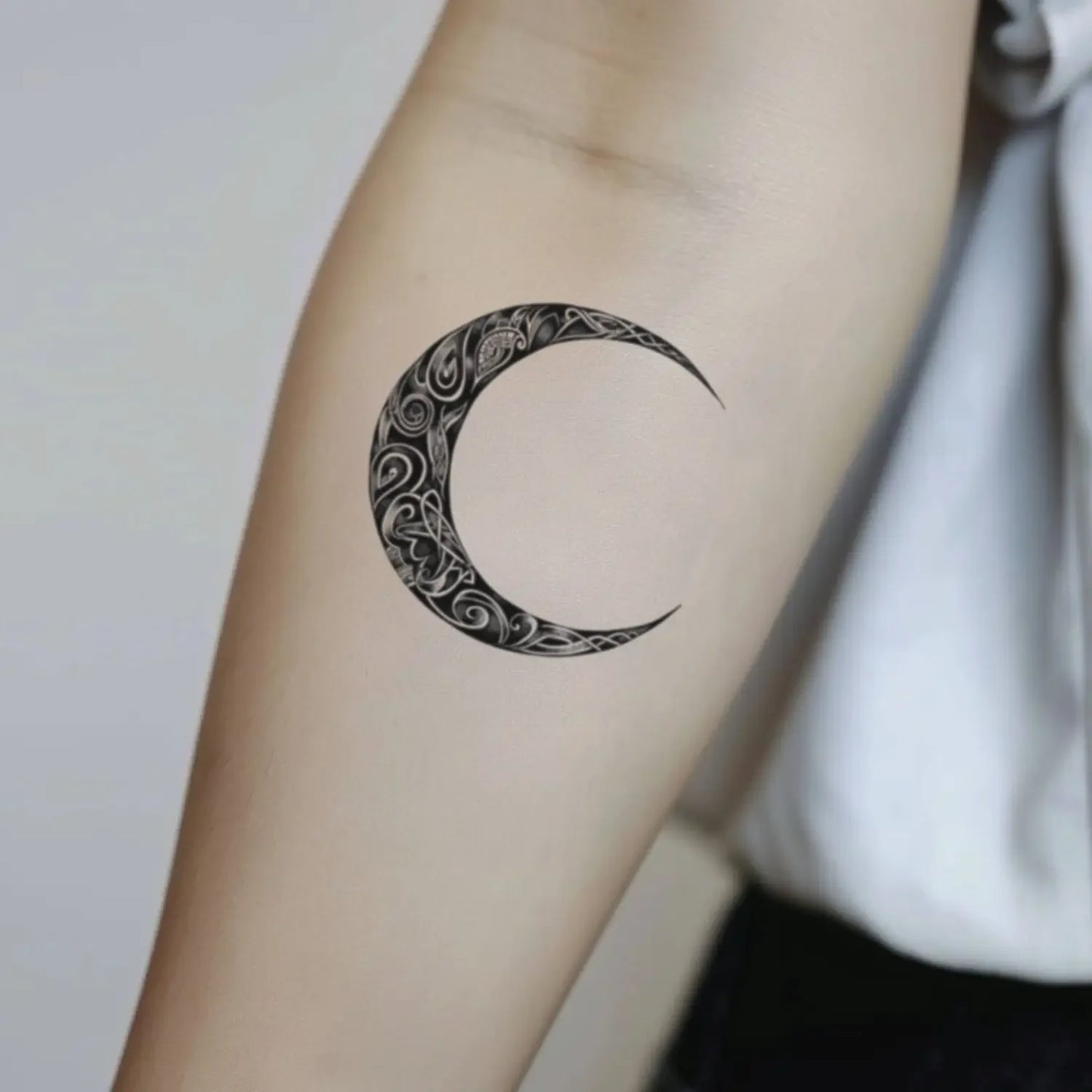 best cool simple small black white grey color tribal celtic moon fake realistic temporary tattoo sticker design idea drawing for men and women on forearm lower inner arm