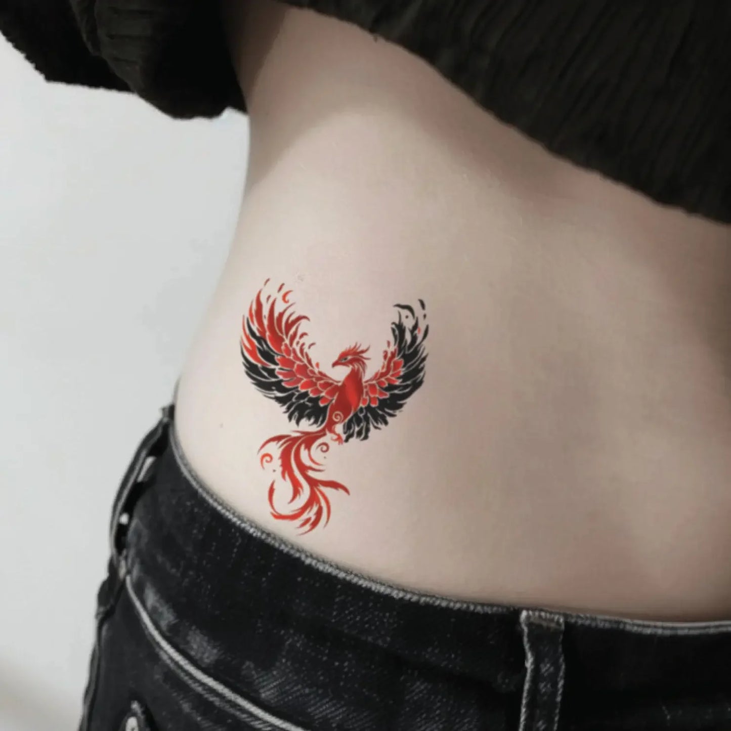 best cool simple small black red color phoenix mythology fake realistic temporary tattoo sticker design idea drawing for men and women on waist