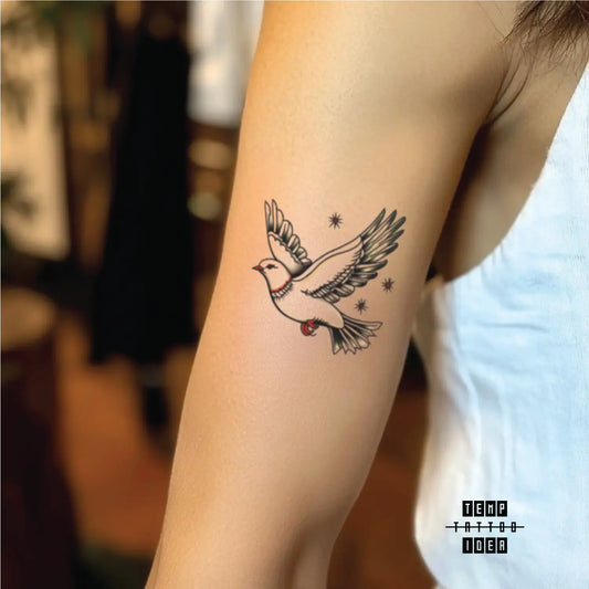 best cool simple small black white grey color traditional simple traditional dove bird outline animal symbol fake temporary tattoo sticker design idea for men and women on bicep