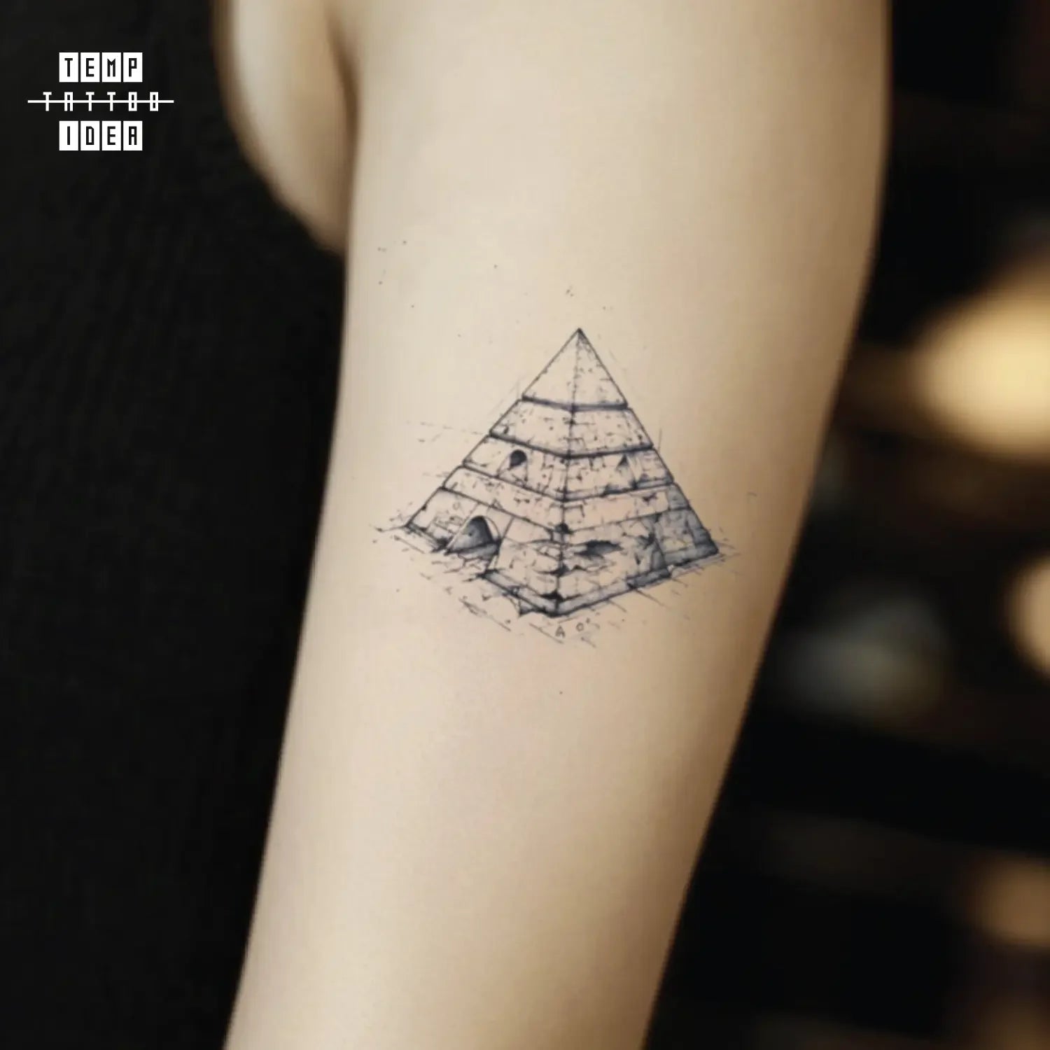 best cool simple small black white grey color fine line egyptian pyramid outline architectural symbol fake temporary tattoo sticker design idea for men and women on bicep