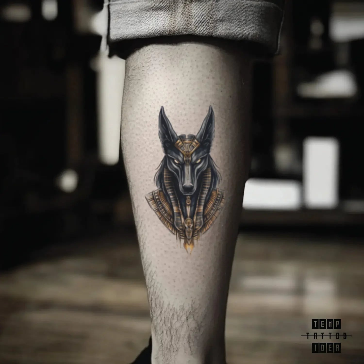 best cool simple small black white grey color illustrative egyptian anubis mythological symbol fake temporary tattoo sticker design idea for men and women on calf