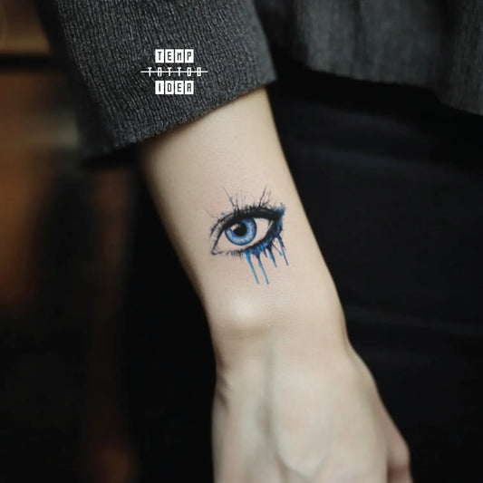 best cool simple small black white grey color realism creepy realistic Halloween makeup blue evil eye horror symbol fake temporary tattoo sticker design idea for men and women on wrist