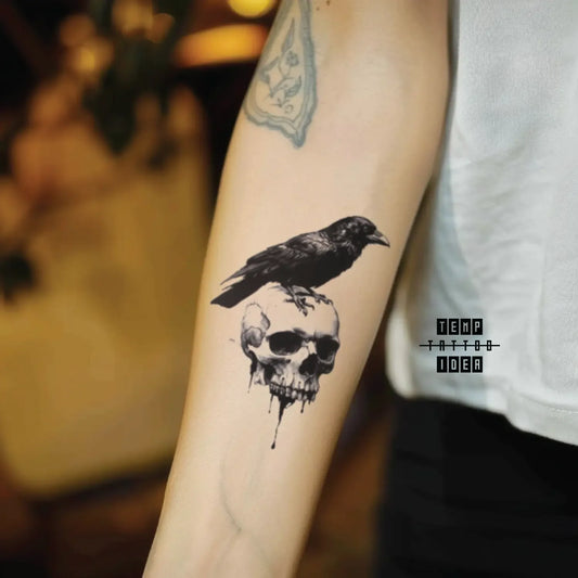 best cool simple small black white grey color gothic gothic crow on skull animal symbol fake temporary tattoo sticker design idea for men and women on forearm