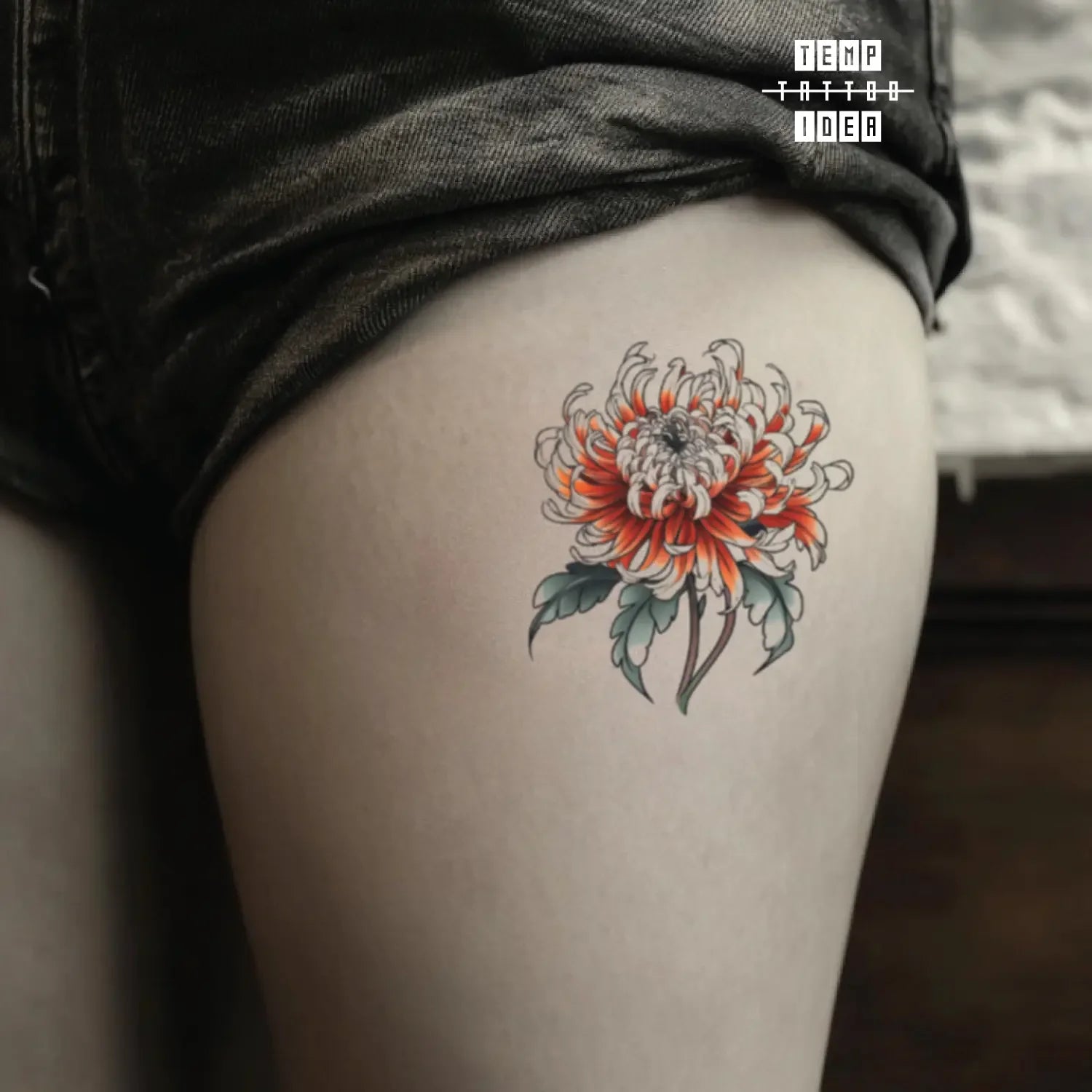 best cool simple small black white grey color orange japanese japanese chrysanthemum flower flower symbol fake temporary tattoo sticker design idea for men and women on thigh