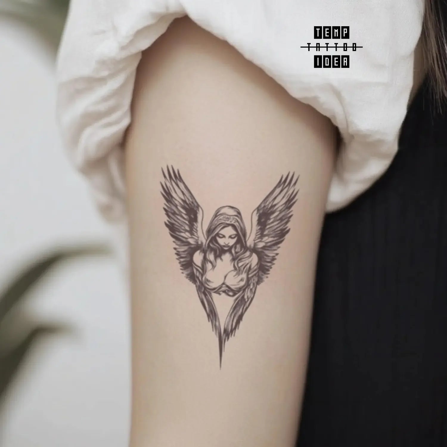 best cool simple small black white grey color sketch simple guardian angel mythological symbol fake temporary tattoo sticker design idea for men and women on bicep